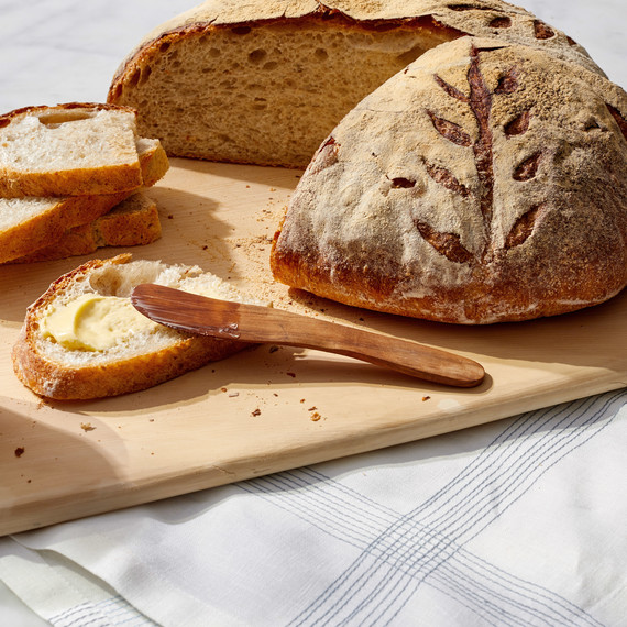 käsityöläinen boule bread martha bakes cutting board slice butter