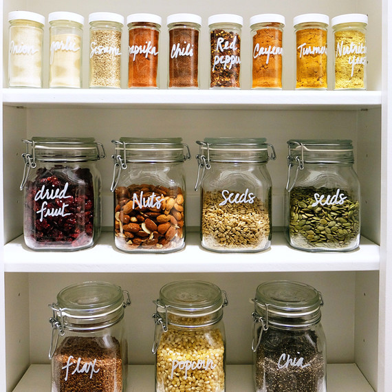 Speisekammer organization spices popcorn grains in jars